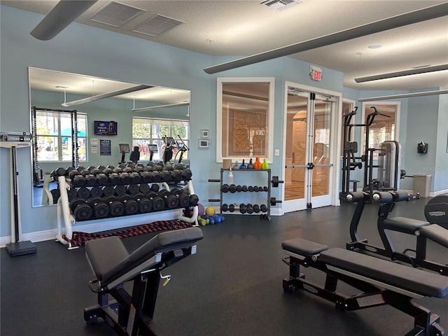 workout area with visible vents and baseboards