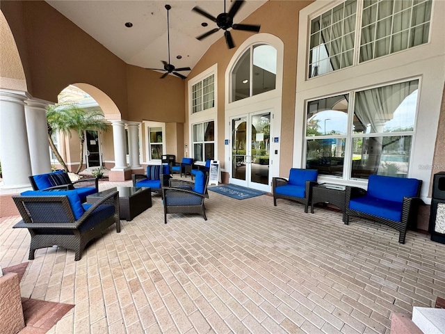 view of patio featuring french doors, ceiling fan, and an outdoor living space