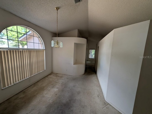 unfurnished dining area with a notable chandelier, carpet, vaulted ceiling, and a textured ceiling