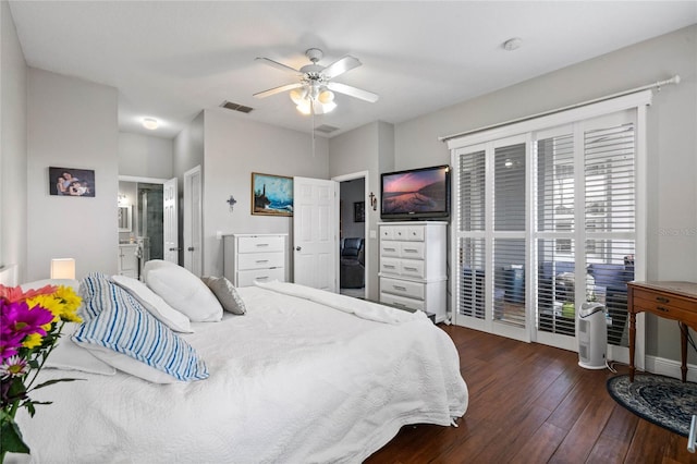 bedroom with visible vents, ceiling fan, ensuite bath, and hardwood / wood-style flooring