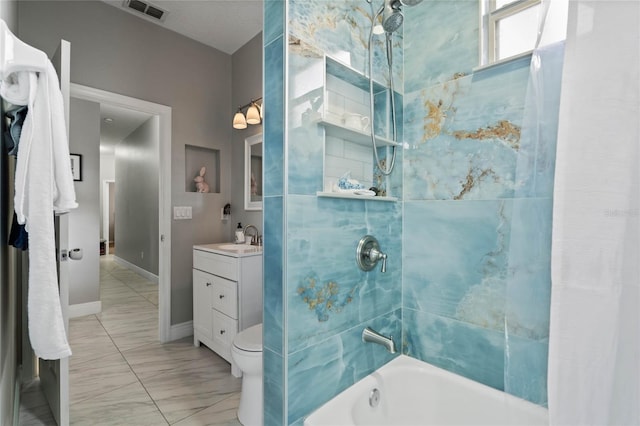 bathroom with vanity, visible vents, baseboards, marble finish floor, and shower / washtub combination