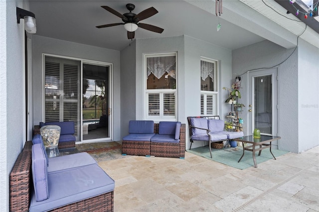 view of patio featuring ceiling fan and an outdoor living space