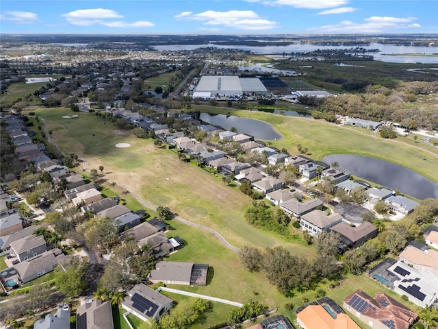 bird's eye view featuring a water view, a residential view, and golf course view