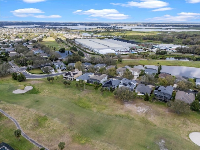 bird's eye view featuring a water view and a residential view