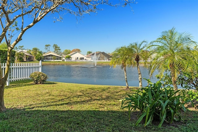 view of water feature with fence