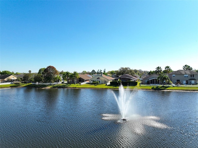 view of water feature with a residential view