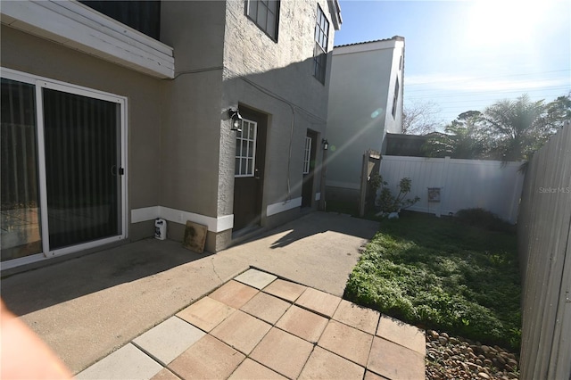 view of patio / terrace with fence