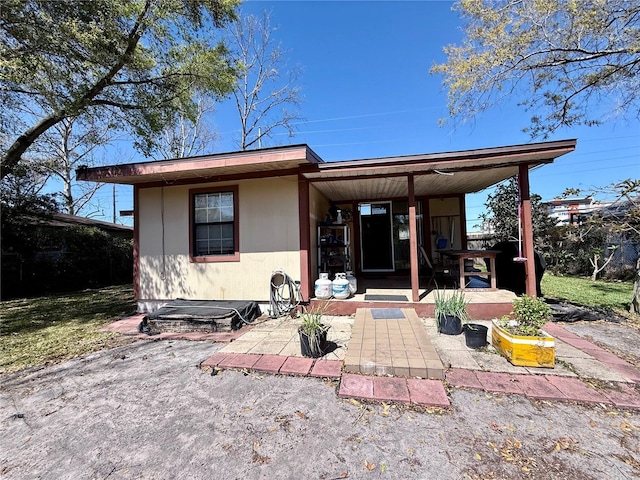 view of front of property with a patio