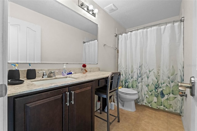 bathroom featuring a shower with shower curtain, visible vents, toilet, and vanity