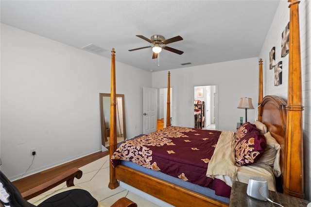 bedroom with visible vents and ceiling fan