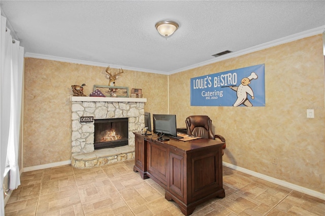 home office featuring ornamental molding, baseboards, a stone fireplace, and a textured ceiling