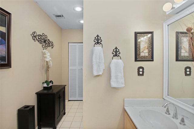 bathroom with tile patterned flooring, vanity, visible vents, and recessed lighting