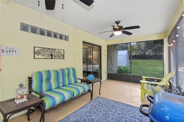 sunroom / solarium with ceiling fan