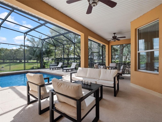 view of patio featuring outdoor lounge area, a lanai, and a fenced in pool