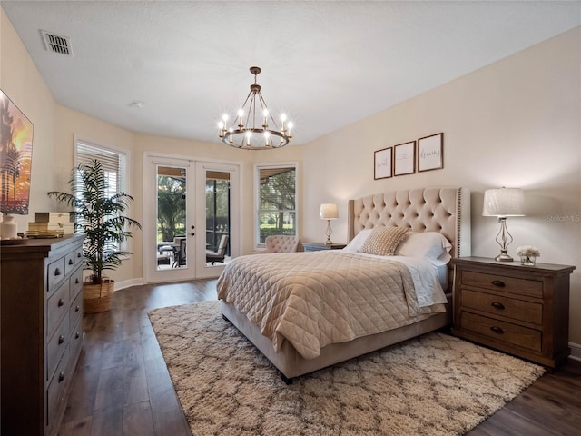 bedroom with access to exterior, french doors, visible vents, and dark wood-type flooring