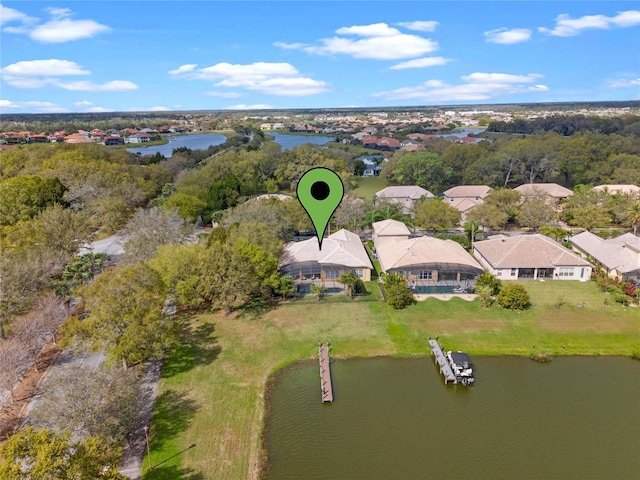 aerial view featuring a residential view and a water view