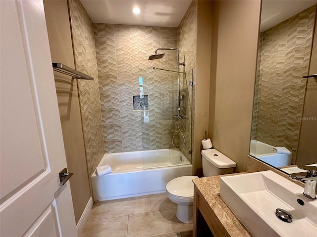 full bathroom with tile patterned flooring, shower / bathing tub combination, vanity, and toilet