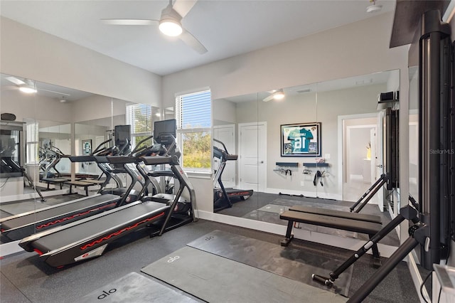 gym featuring visible vents, baseboards, and a ceiling fan