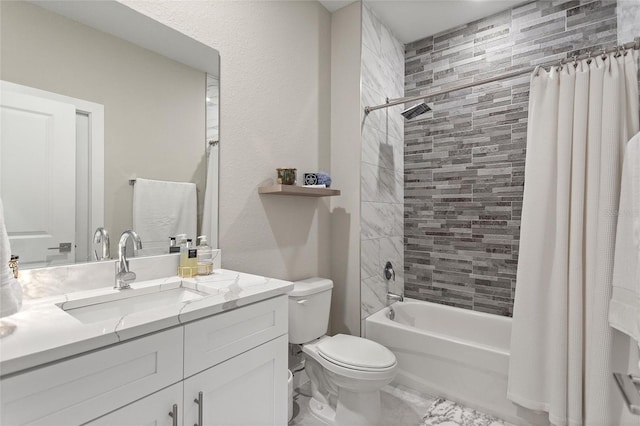 full bath featuring shower / tub combo, vanity, and toilet