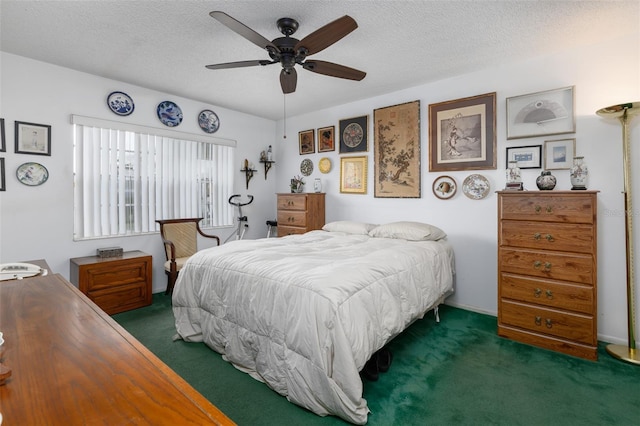 bedroom featuring carpet floors, ceiling fan, and a textured ceiling