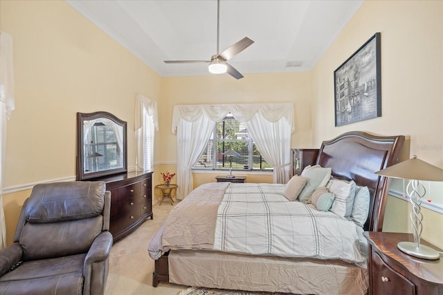 bedroom featuring visible vents, ornamental molding, ceiling fan, and carpet floors