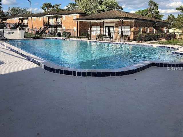 pool featuring fence