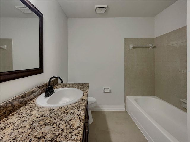 bathroom featuring toilet, vanity,  shower combination, tile patterned flooring, and baseboards