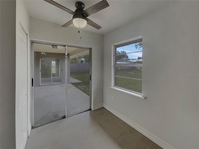 interior space featuring a ceiling fan