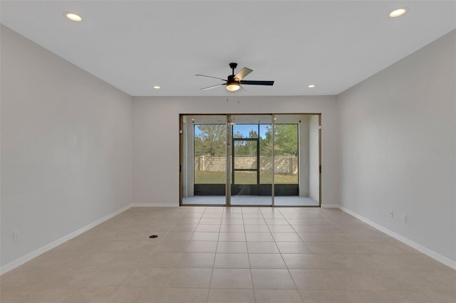 spare room with light tile patterned floors, baseboards, a ceiling fan, and recessed lighting