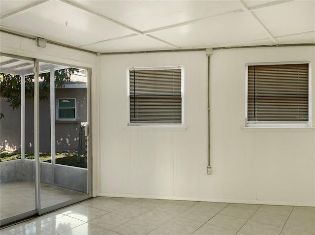 spare room featuring light tile patterned floors