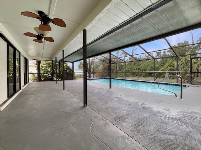 outdoor pool featuring a ceiling fan, a lanai, and a patio area