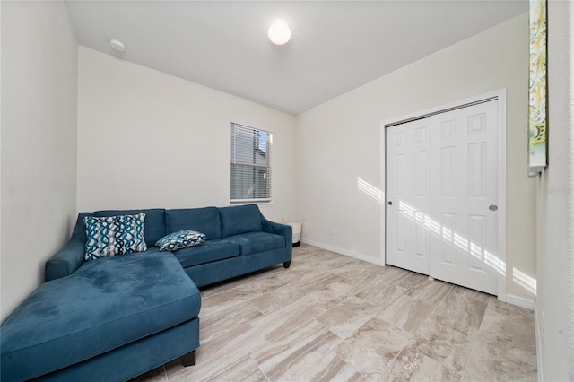 living room featuring baseboards