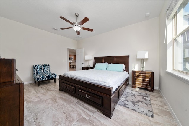 bedroom with baseboards, visible vents, and a ceiling fan