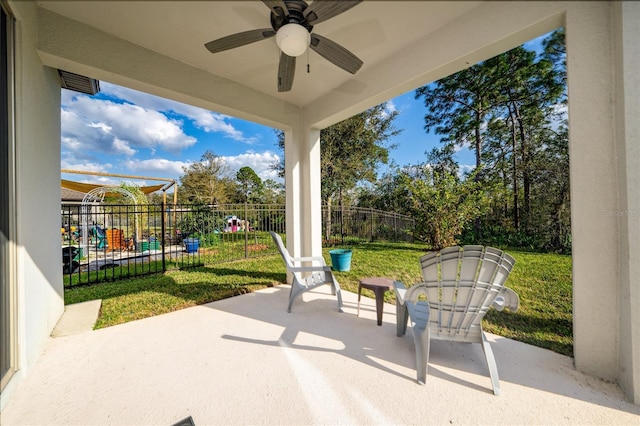 view of patio / terrace featuring a fenced backyard and a ceiling fan