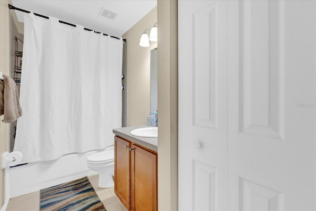 full bath with toilet, tile patterned floors, visible vents, vanity, and shower / tub combo with curtain