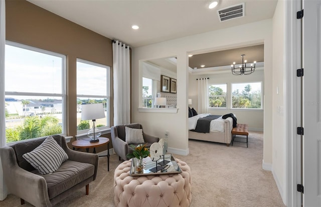 interior space with a chandelier, recessed lighting, visible vents, baseboards, and carpet