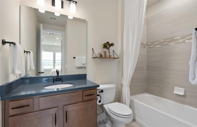 bathroom with toilet, vanity, visible vents, and shower / bathtub combination with curtain