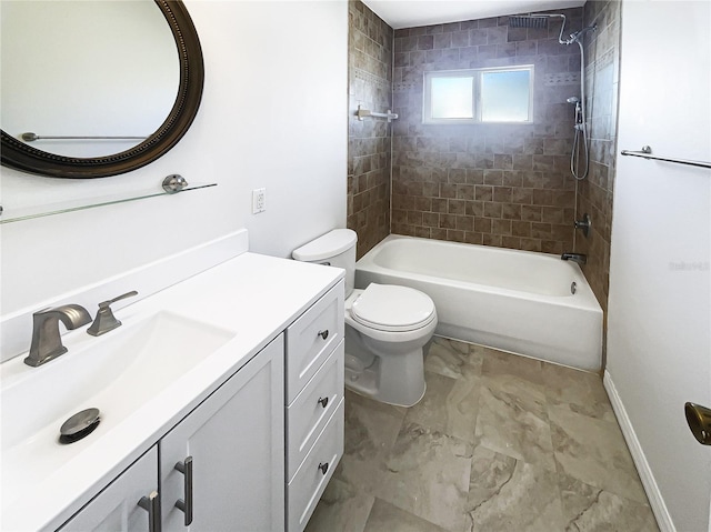 full bath featuring toilet, vanity, baseboards, and shower / bathing tub combination