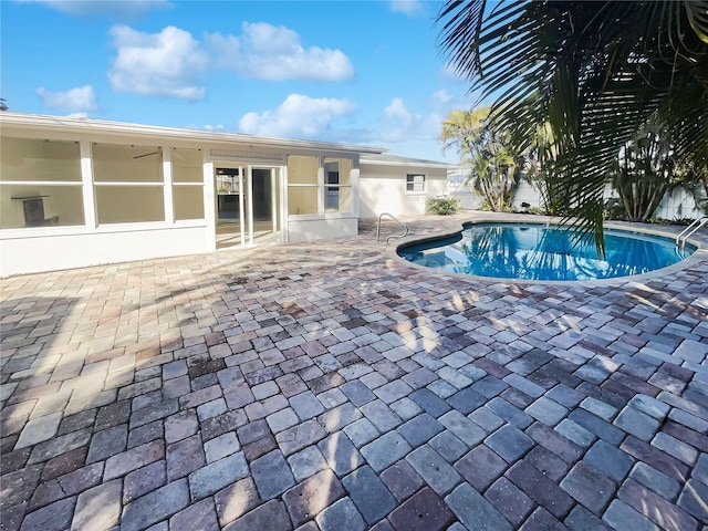 view of pool with a patio and a fenced in pool