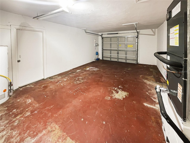 garage with gas water heater and heating unit