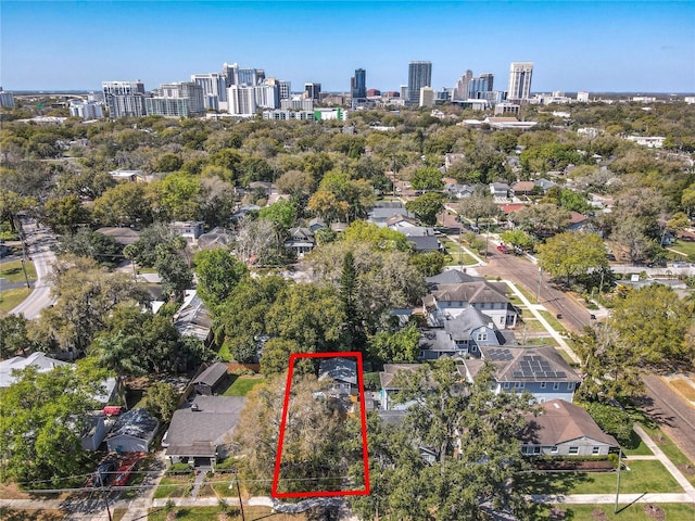 birds eye view of property featuring a view of city