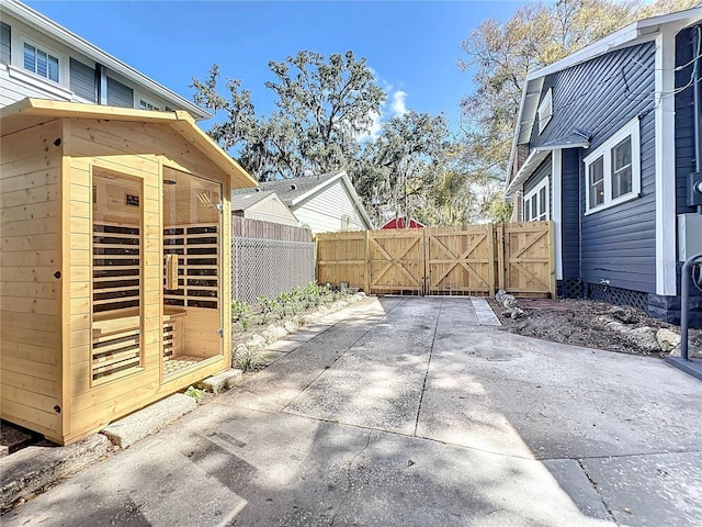 view of patio / terrace with a gate and fence