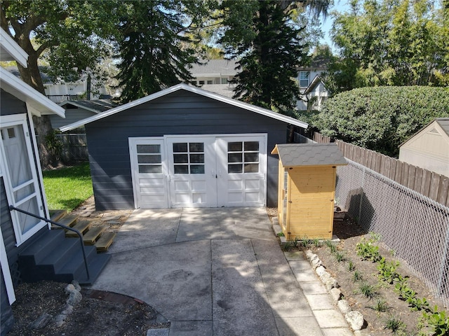 detached garage with fence