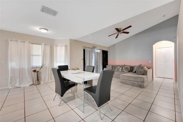 68 Herring Ct, Kissimmee, FL 34759 - dining area with light tile patterned floors, a ceiling fan, visible vents, baseboards, and vaulted ceiling