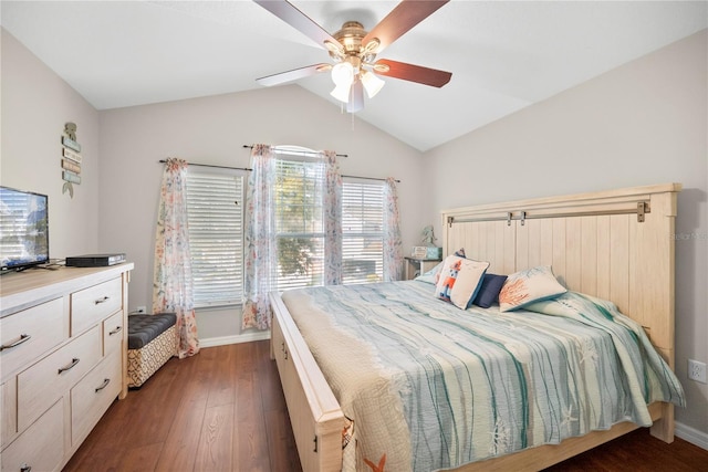 bedroom with lofted ceiling, dark wood-style flooring, a ceiling fan, and baseboards