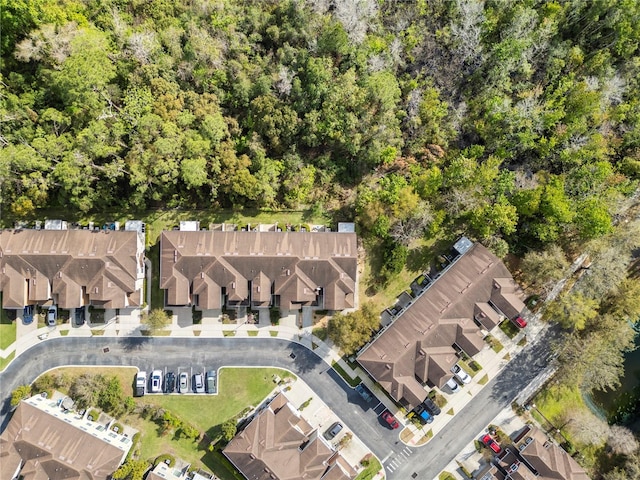 birds eye view of property with a residential view