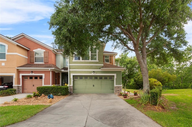 2015 Shalimar Loop, Sanford, FL 32773 - view of front of house with stone siding, a garage, stucco siding, and driveway