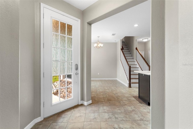 2015 Shalimar Loop, Sanford, FL 32773 - entrance foyer with a chandelier, stairway, and baseboards