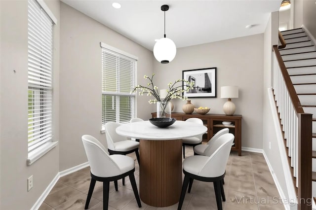 2015 Shalimar Loop, Sanford, FL 32773 - dining space featuring stairs, plenty of natural light, and light tile patterned floors