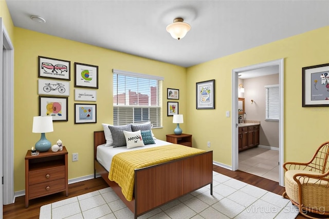 2015 Shalimar Loop, Sanford, FL 32773 - bedroom with wood finished floors and ensuite bathroom